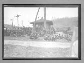 [spectators sitting at race]