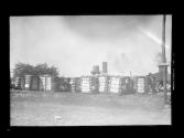 [water towers and cotton bales]