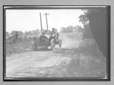 [auto racing on country road]