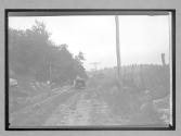 [auto driving on country road]