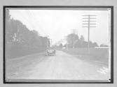 [auto driving on country road]