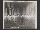 [Catholic men from an Infantry Division in England participate in service in Catholic mission service sponsored by HQ, SOS, ETO. The man are reading the consecration to the immaculate heart of Mary as Chaplain Thomas F. Keenan, Boston, MASS. Approaches the altar. St. Machall's Church, men of the 5th Div, Tidworth, Wilts, Eng.]