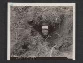 [Close-up of a partially uncovered land mine with demolition charge of TNT placed against it. (Regimental maneuvers in England).  7th Engr Regt, 5th Inf Div, Blackpool Sands, Devon, England.]