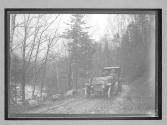 [auto on country road]