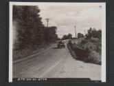 [An M8 armored scout car of a Cavalry Reconnaisance Troop speeding along the road while on a tactical excerise. Tidworth, England.]