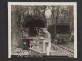 [T/5 Leonard Okonek, La Crosee, WIS., was a carpenter in civil life and still works his trade for a signal company somewher in Northern Ireland. 5th Sig Co, 5th Inf Div. Tollymore Park Camp, Bryansford, County Down, No. Ireland.]
