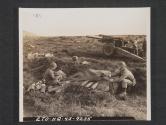 [Preparing the ammunition for a 155 mm. Howitzer on a firing range in the United Kingdom are PVT Arcadic Carcifi, Philadelphia, PA., Powder man, and PVT Kenneth J. Woodward, Waterloo, Maine, who is fusing the shell.  B Battery, 21st FA BN, 5th Inf Div, near Annalong, County Down, No. Ireland.]