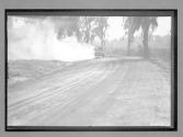 [auto racing on country road]