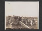 [The crew of a 155 mm. Howitzer in position at the piece during firing practise in the United Kingdom.  B Battery, 21st FA BN, 5th Inf Div., near Annalong, Country Down, No. Ireland.]