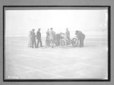 [auto testing at beach]