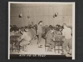 [Signal school in United Kingdom. Group of men in communication course practising in sending and receiving code.  5th Inf Div., Newcastle, County Down, No. Ireland.]