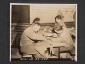 [Gas school in Northern Ireland. Officer students at school repair gas masks as part of their training. 5th Inf Div, Seaforde, Co. Down. No. Ire. ]