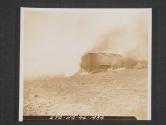 [View of a burning pill box after a flame thrower hit it.  7th Engr. BN., 5th Inf Div., near Dundrum, Co. Down, Northern Ireland]