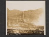 [Telephoto shot of smoke shells decending during a demonstration in the U.K.  5th Inf Div Art., near Annalong, County Down, Northern Ireland]