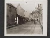 [American infantrymen pass through Cherre, France, in the drive which took them past Angers, France.]