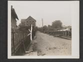 [American infantrymen driving for Angers, France, take cover behind a bridge and fire across the river on Germans fighting delaying action.]