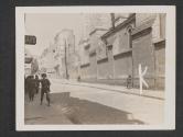 [American troops deploy and run for cover as they move into the town of Angers, France. Care had to be taken of German snipers who were still in the town.]
