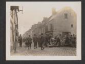 [French citizens remove a road block in Etamps, France, to aid the progress of American and French troops driving the Nazis out of their country.]