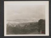 [Infantrymen advance to the Moselle River under the cover of an artillery smoke screen on their way to Metz, France.]