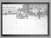 [auto racers driving in the town of "Ft. Dodge"]