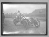 [auto racer at track]