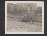 [This G.I. Joe, a member of the 10th Infantry Regt., 5th Infantry Div. looks over a German 20mm gun that has been blasted to pieces by American 60mm mortar fire in the city of Metz, France.]
