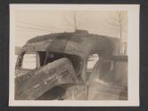 [American ambulance which was straffed [sic] by German pillotted [sic] P47's according to witnesses. The ambulance was plainly marked, and the weather was clear.  5th. Med. BN., 5th. Inf., Div., Gonderange, Luxembourg.]