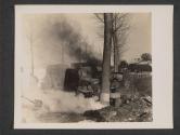 [American ambulance, clearly marked, a few minutes after it had been straffed [sic] by (according to eye witnesses) P 47's pilotted by Germans. Driver and patient were killed. Action took place in Luxembourg.  5th. Med. BN., 5th Inf., Div., Gonderange, Luxembourg]