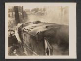 [American Ambulance, clearly marked, just after it had been straffed [sic] by (according to eye witnesses) German pilotted [sic] P 47's driver and patients were killed.  5th Med BN., 5th Inf Div., Gonderange, Luxembourg. ]