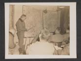 [Major General S. Leroy Irwin, Commanding General, 5th Infantry Division, (standing with pointer), briefs regimental commanders prior to division's attack across Sauer River and Siegfried line Germany.  5th Inf Div.]