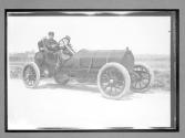[auto racers parked on road]
