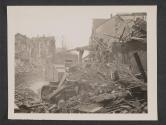 [Armoured bulldozer of 5th infantry Division. 3rd U.S. Army, moves piles of rubble aside in Bitburg, Germany.   5th Inf Div TUSA]