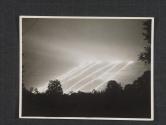 [Anti aircraft meets German airplanes as they come over on a night raid to hit air strips and artillery postions somewhere in France. Cerisey La Foret, France]