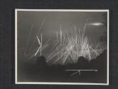 [American anti aircraft meets German airplanes as they come over on a night raid to hit air strips and artillery positions somewhere in France. Cerisey La Foret, France]