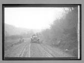 [auto driving on country road]