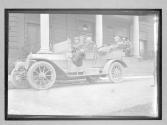 [auto tour, men in auto]