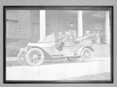 [auto tour, men in auto]