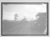 [auto on country road]