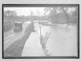 [auto passing flooded area]