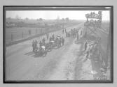 [autos lined up at track "#2, #3"]