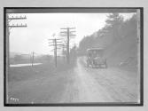 [auto driving along river "Premier"]
