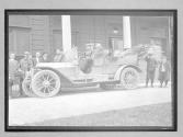 [auto tour men in auto]