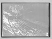 [auto driving on rutted road]