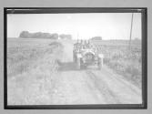 [auto driving on country road]