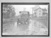 [auto driving on muddy road]