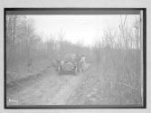 [auto parked on country road]