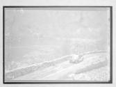 [auto driving along river]
