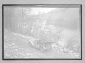 [auto driving along river]