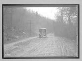 [auto driving on country road]