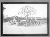[two autos in town]